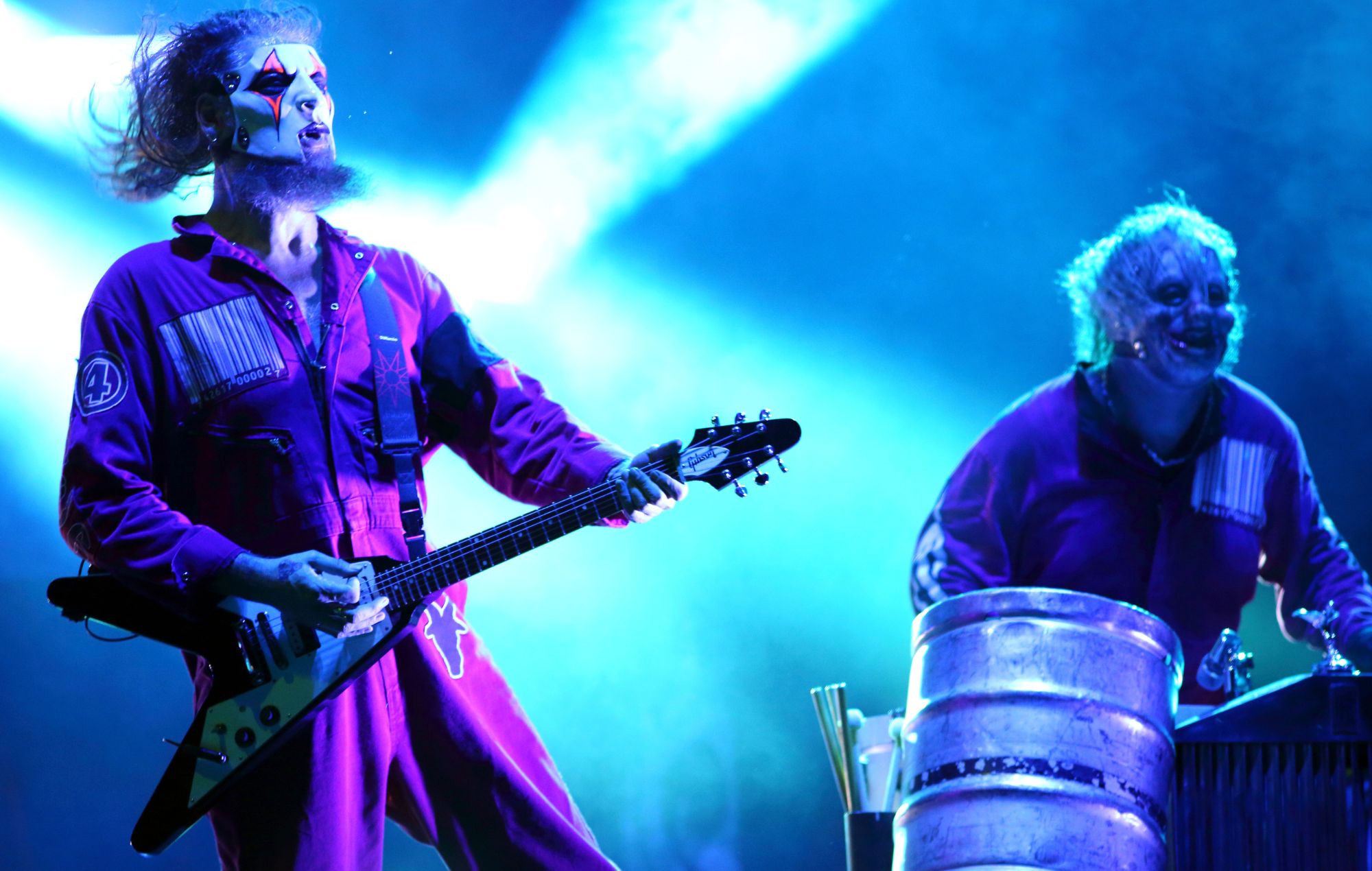 Jim Root and Shawn 'Clown' Crahan of Slipknot performs live in 2024.